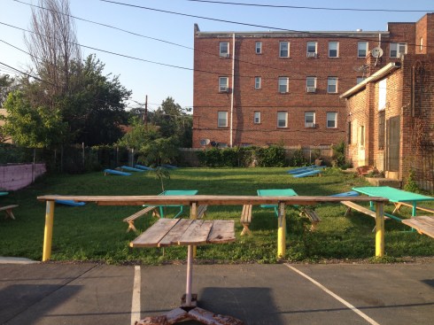 Righthand Side of Bardo with Cornhole and Tables