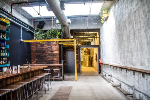 A Peak Through the Door to the Distillery at Cotton & Reed